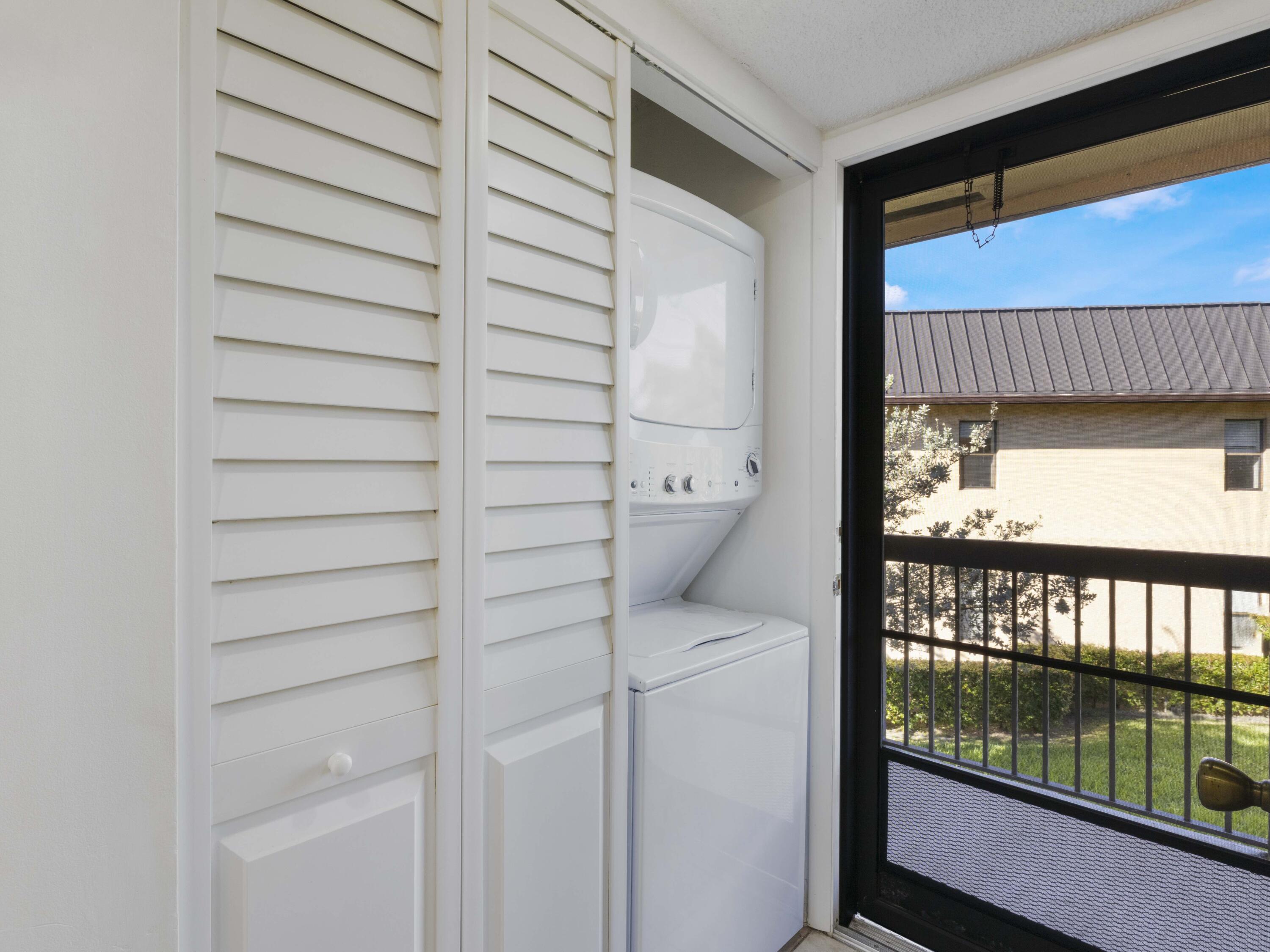 151 Northwest 93rd Avenue, Unit 151 Pembroke Pines, FL 33024 - Photo 29 of 37 FULL SIZE Laundry Open