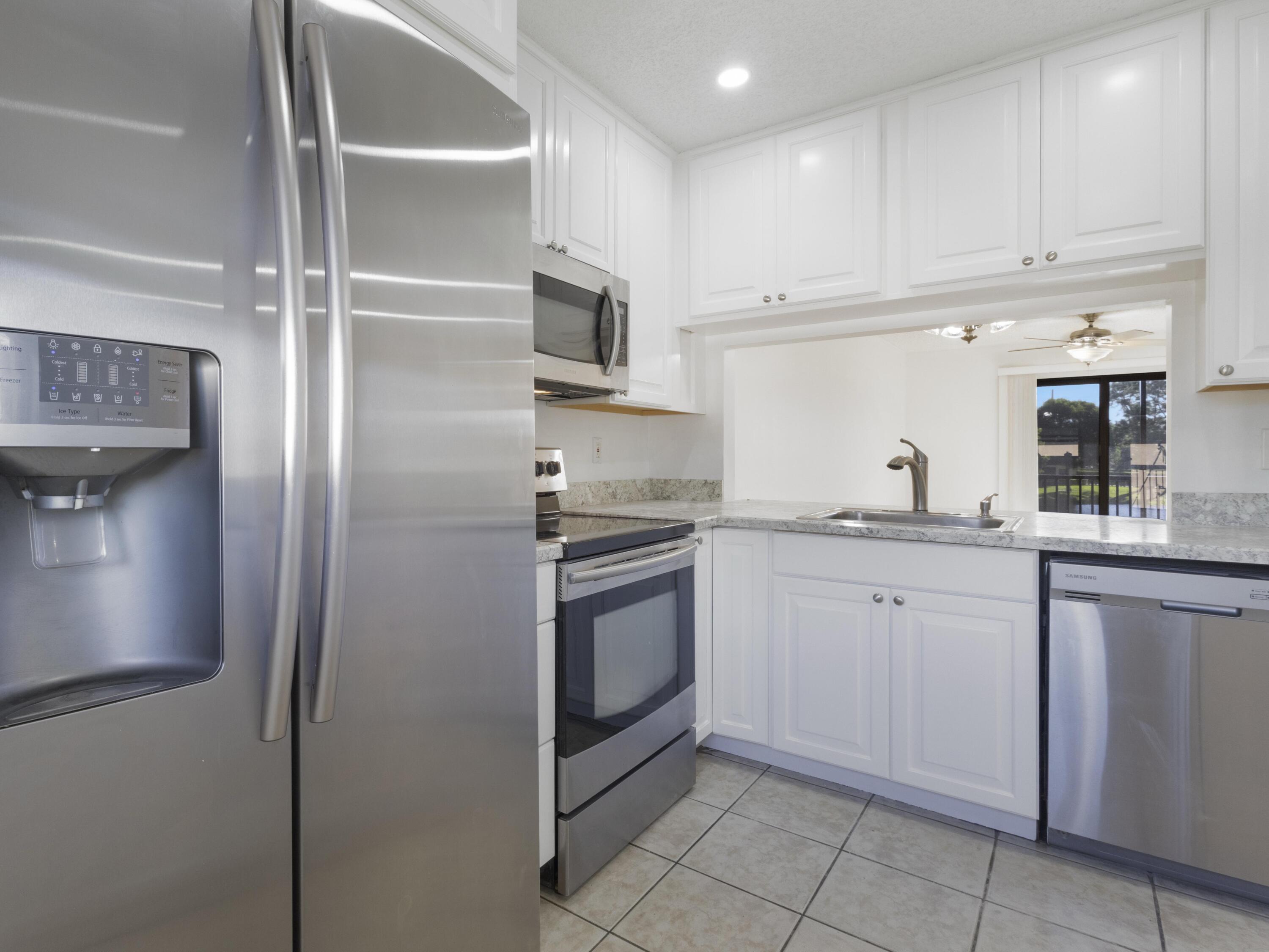 151 Northwest 93rd Avenue, Unit 151 Pembroke Pines, FL 33024 - Photo 9 of 37 Kitchen 2