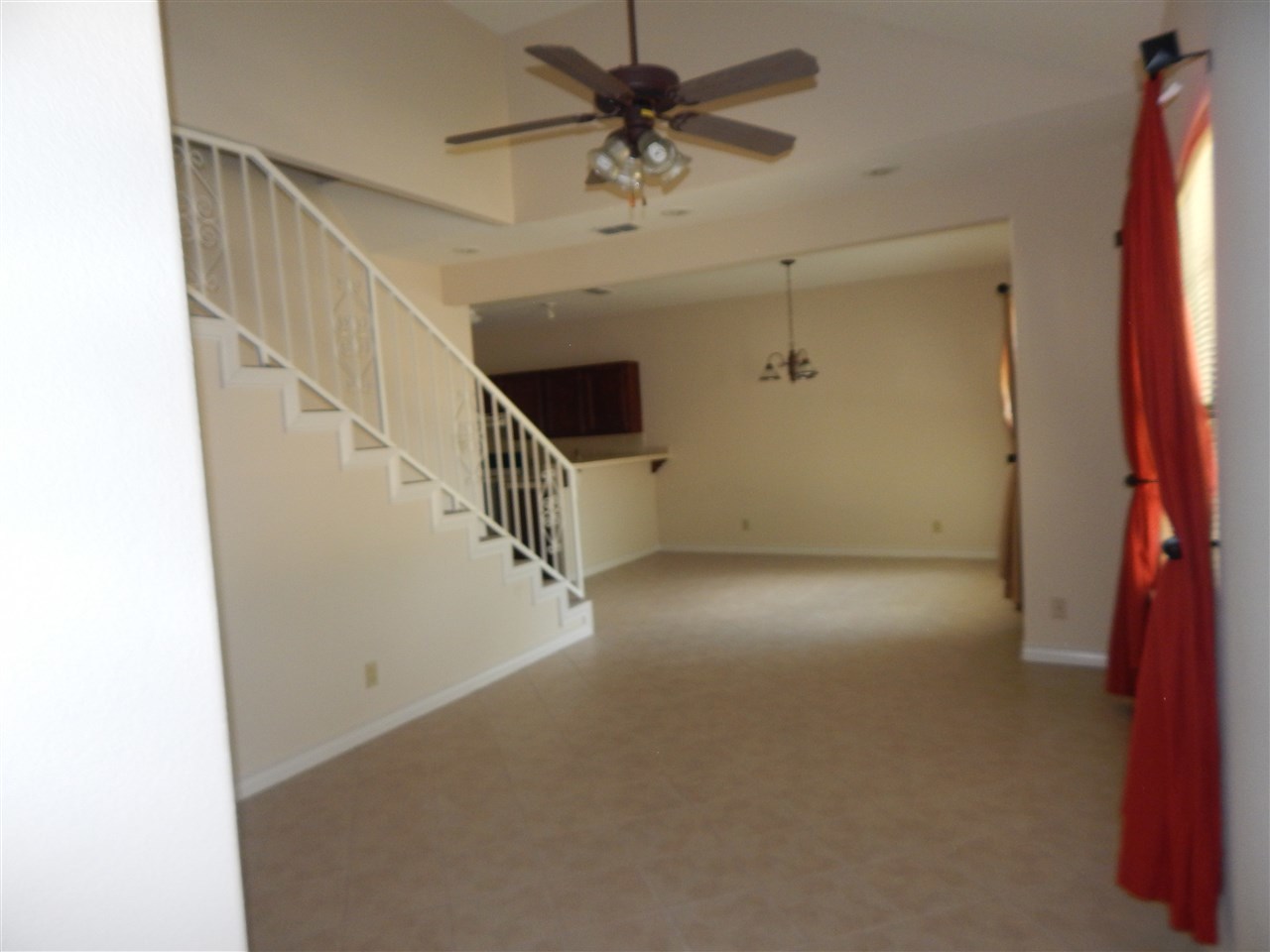 1602 Jacaman Road, Unit 4 Laredo, TX 78041 - Photo 3 of 9 a view of a livingroom with a ceiling fan and window