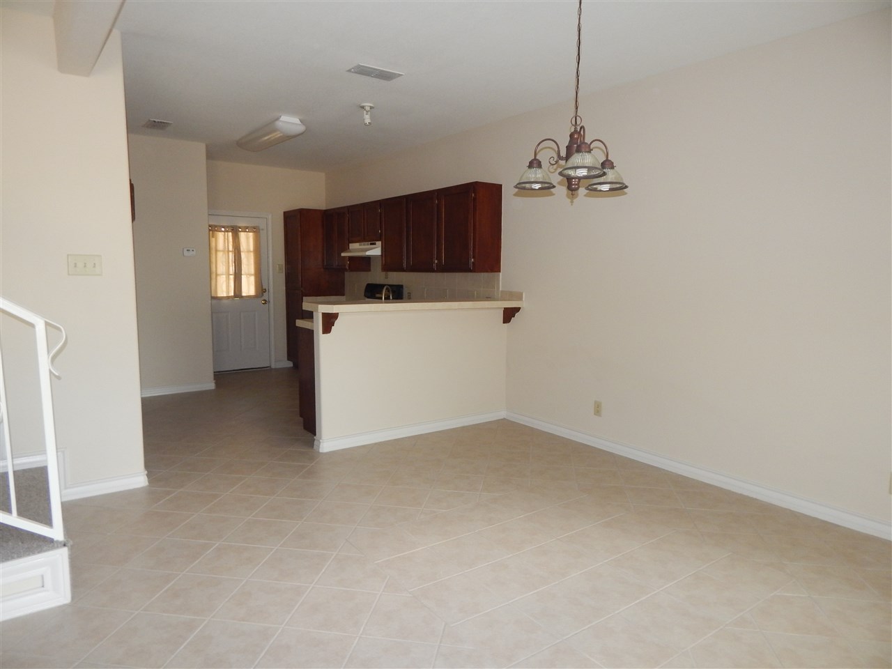 1602 Jacaman Road, Unit 4 Laredo, TX 78041 - Photo 4 of 9 a view of a livingroom with a kitchen