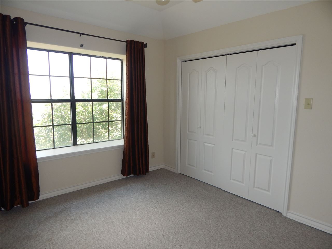 1602 Jacaman Road, Unit 4 Laredo, TX 78041 - Photo 8 of 9 a view of an empty room with a window