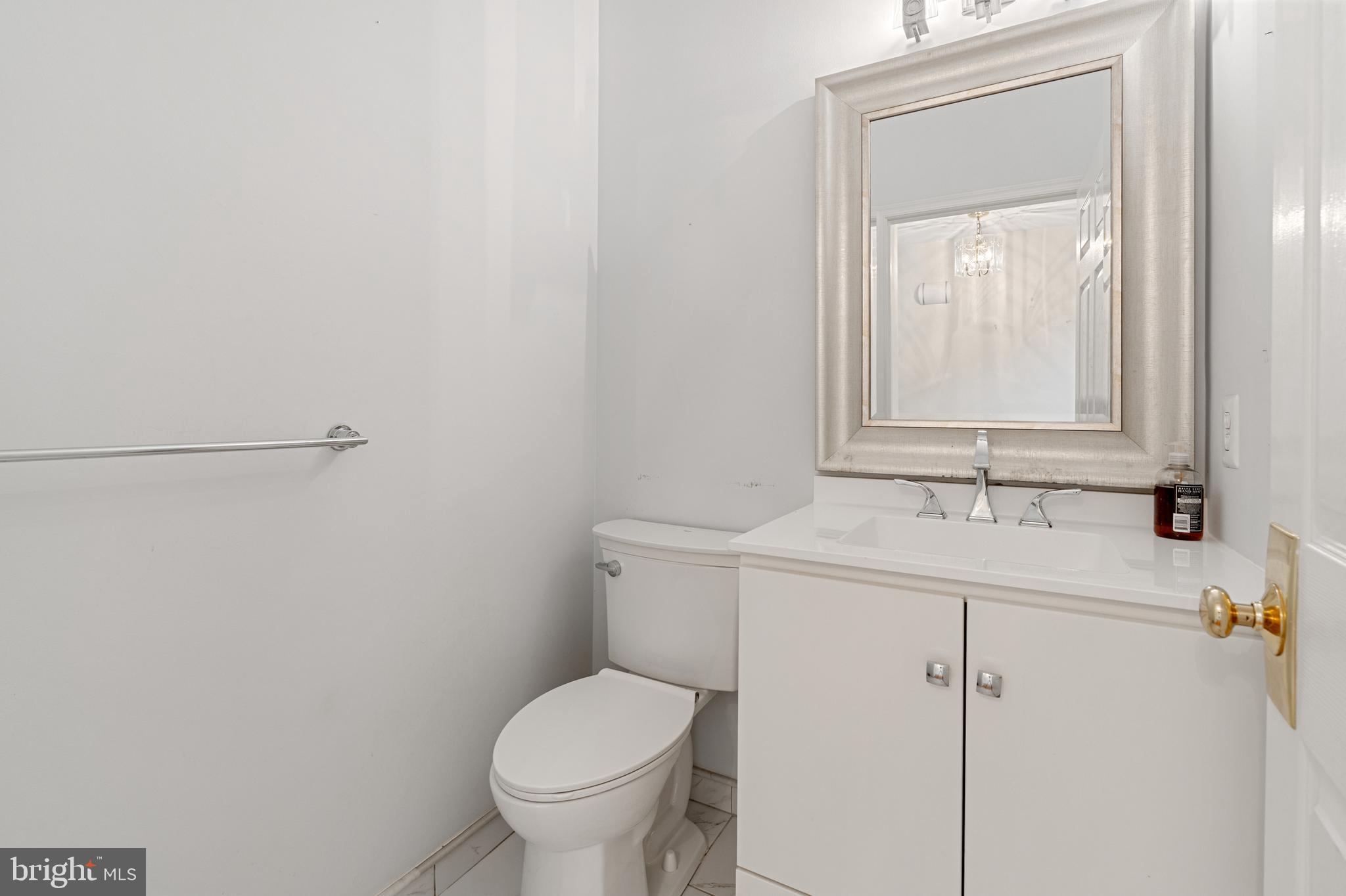 4913 Mead Drive Doylestown, PA 18902 - Photo 16 of 41 a bathroom with a sink and a toilet