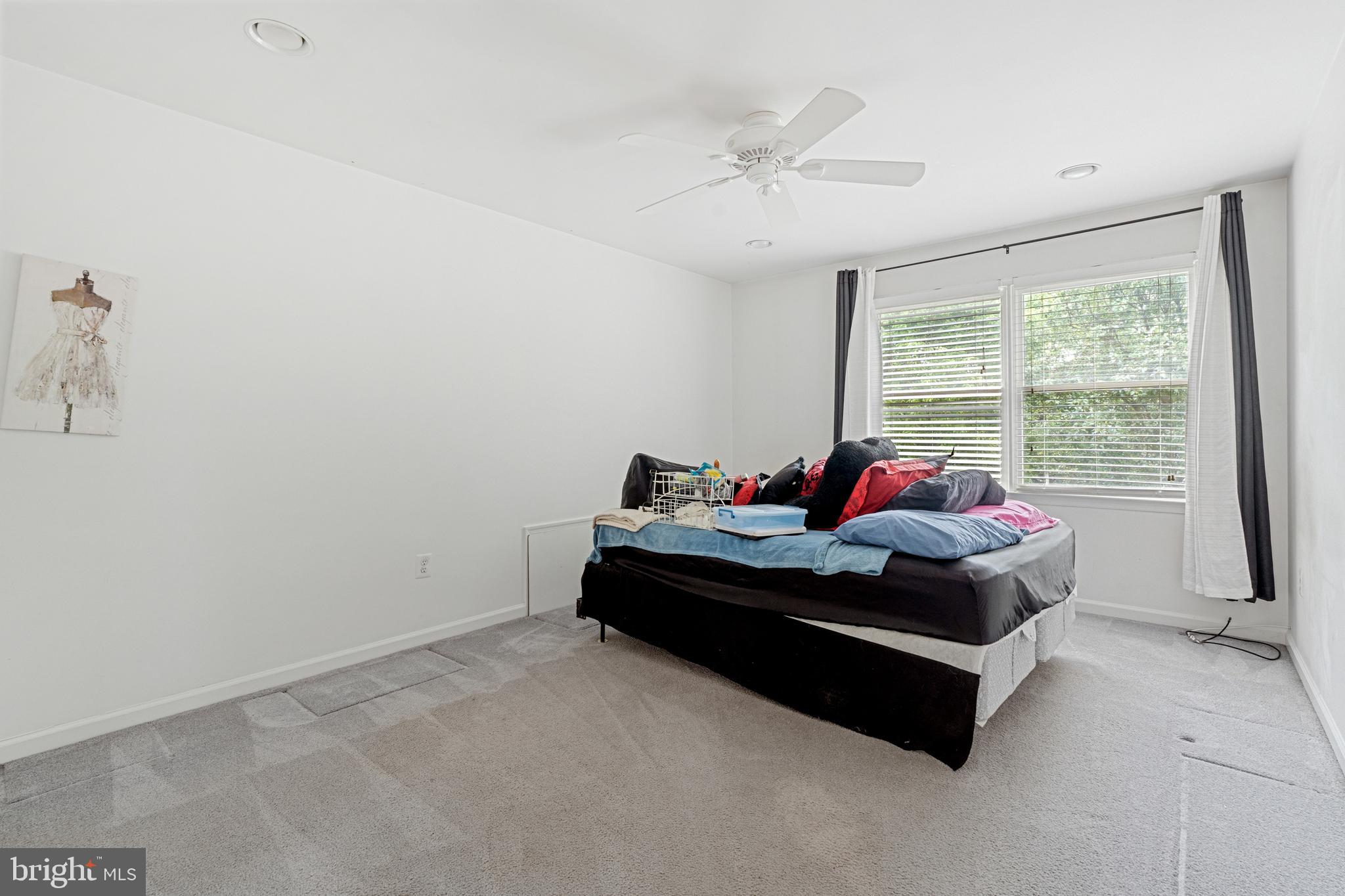4913 Mead Drive Doylestown, PA 18902 - Photo 28 of 41 a living room with furniture and a window