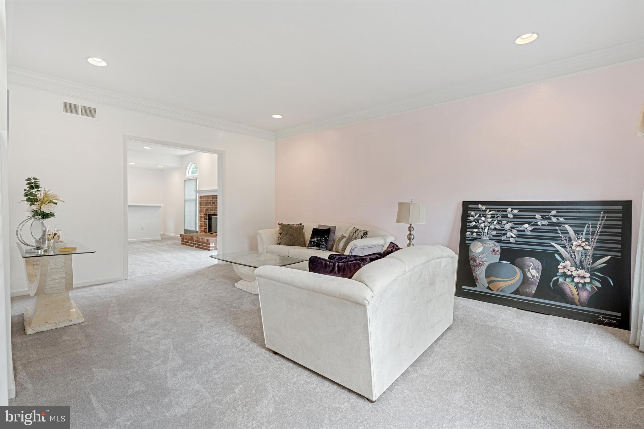 4913 Mead Drive Doylestown, PA 18902 - Photo 7 of 41 a living room with furniture and a fireplace