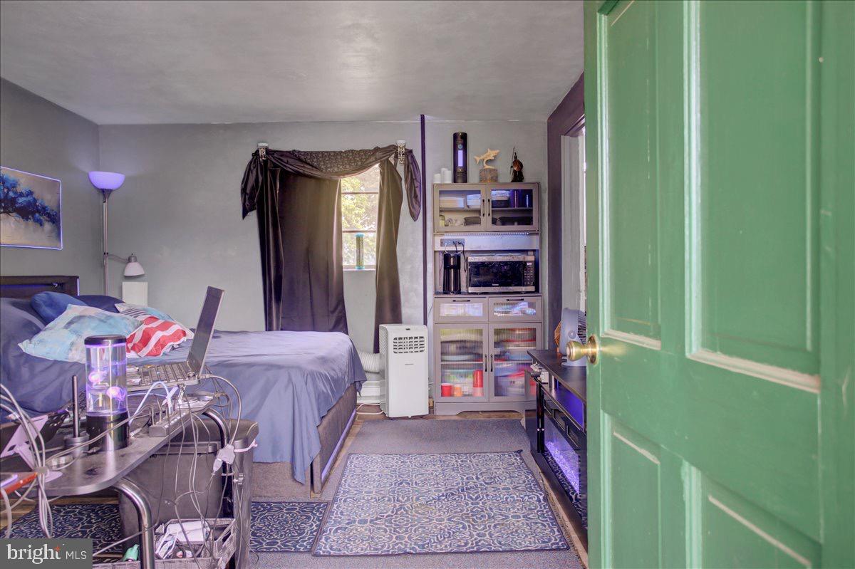 12494 Path Valley Road Willow Hill, PA 17271 - Photo 11 of 32 a bedroom with furniture and a closet