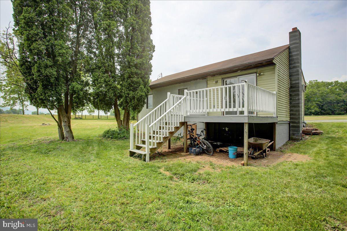 12494 Path Valley Road Willow Hill, PA 17271 - Photo 15 of 32 a view of a house with a big yard and large trees