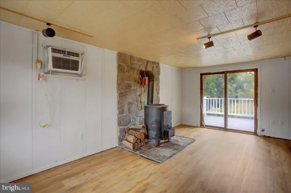 a view of entryway with wooden floor