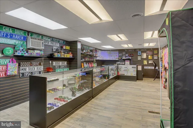 a kitchen with stainless steel appliances kitchen island granite countertop lots of counter top space