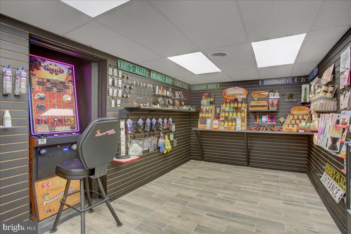 12494 Path Valley Road Willow Hill, PA 17271 - Photo 10 of 32 a room with lots of wooden furniture and a window