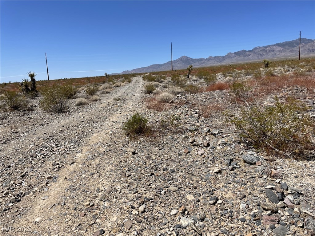 7030 North Koala Road Pahrump, NV 89060 - Photo 3 of 9 View of mountain background featuring rural landscape