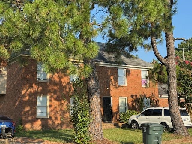 3461 Lichterman Road Memphis, TN 38115 - Photo 4 of 4 a front view of a house with garden