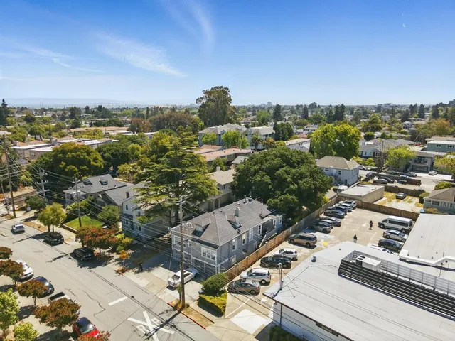 an aerial view of a city with lots of residential buildings