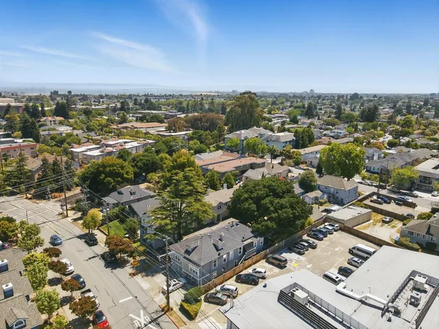 an aerial view of a city with lots of residential buildings
