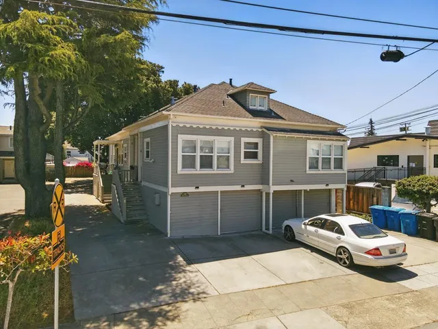 a car parked in front of a house