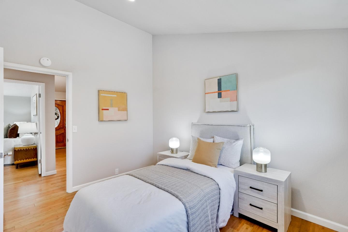 1755 Ravizza Avenue Santa Clara, CA 95051 - Photo 32 of 36 a bedroom with a bed and wooden floor