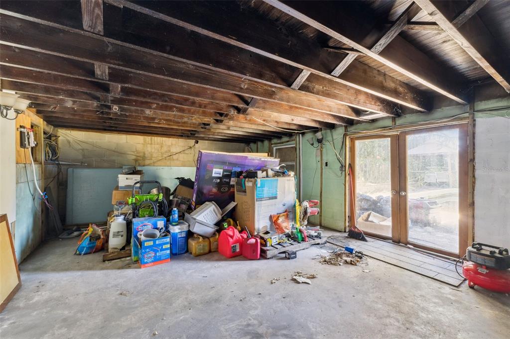 3828 Walker Road Apopka, FL 32703 - Photo 20 of 34 a view of a room with gym equipment