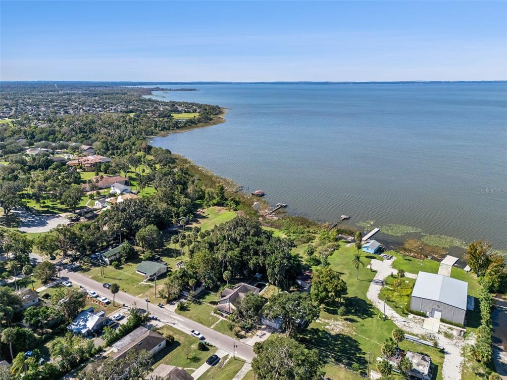 3828 Walker Road Apopka, FL 32703 - Photo 26 of 34 a view of an outdoor space and a lake view