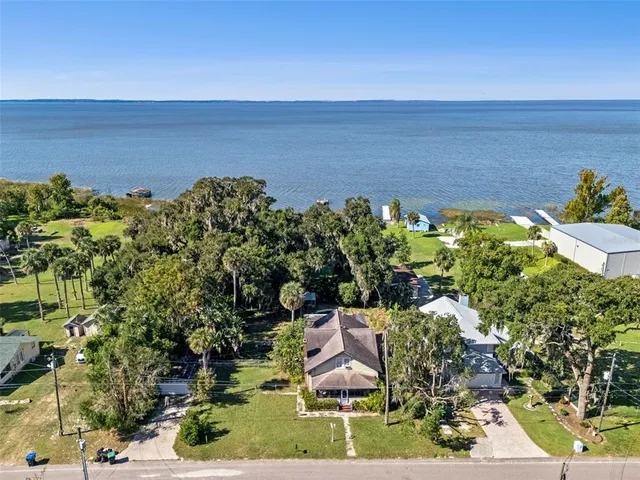 a view of a garden with an ocean