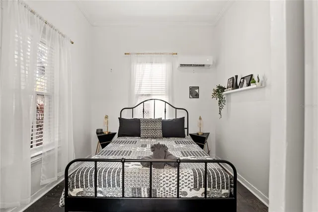 a view of a bedroom from a hallway