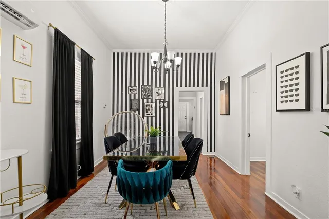 a view of a hallway with furniture and front door