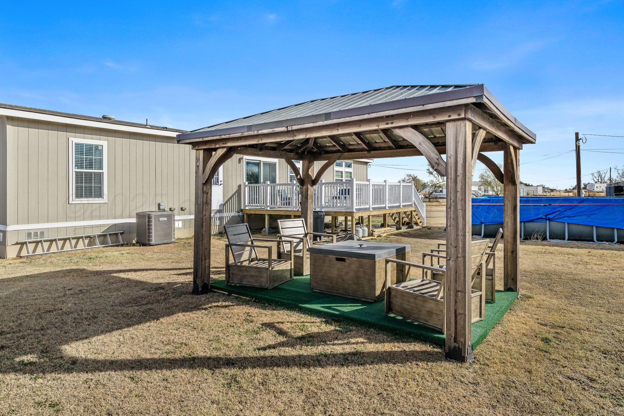 441 West Plantation Road Amarillo, TX 79118 - Photo 18 of 25 a house view with a garden space