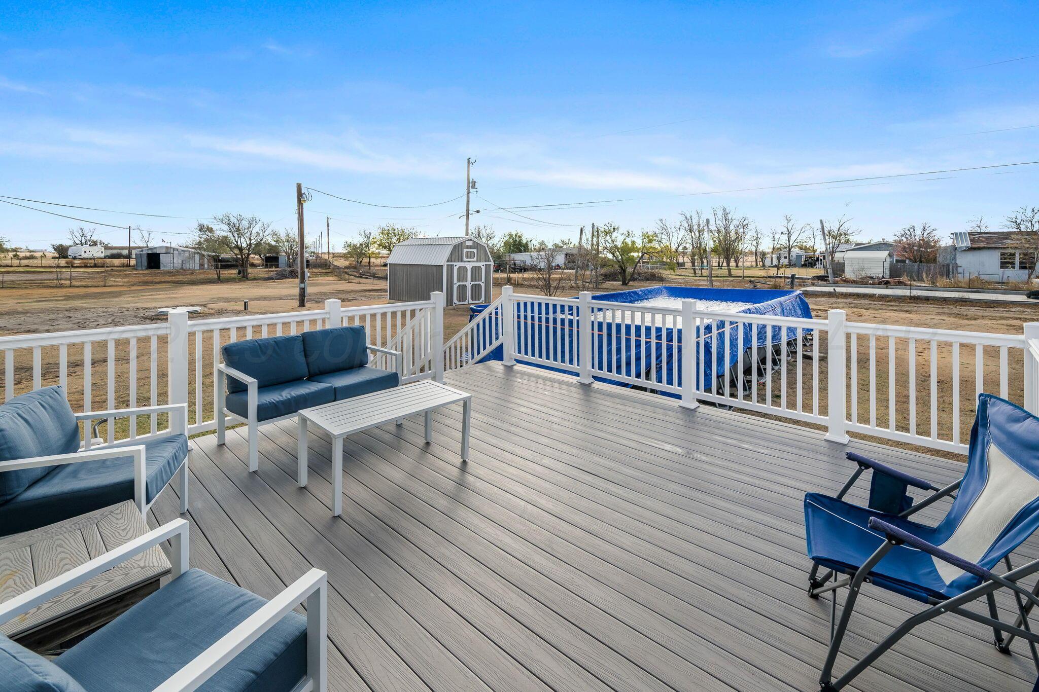 441 West Plantation Road Amarillo, TX 79118 - Photo 19 of 25 a view of a terrace with wooden benches