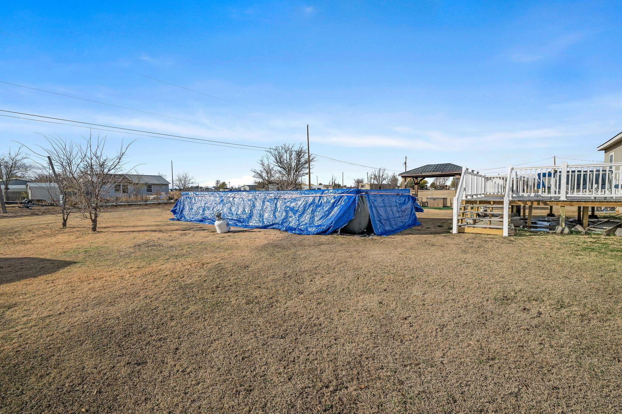 441 West Plantation Road Amarillo, TX 79118 - Photo 20 of 25 a view of a house with a yard and wooden fence