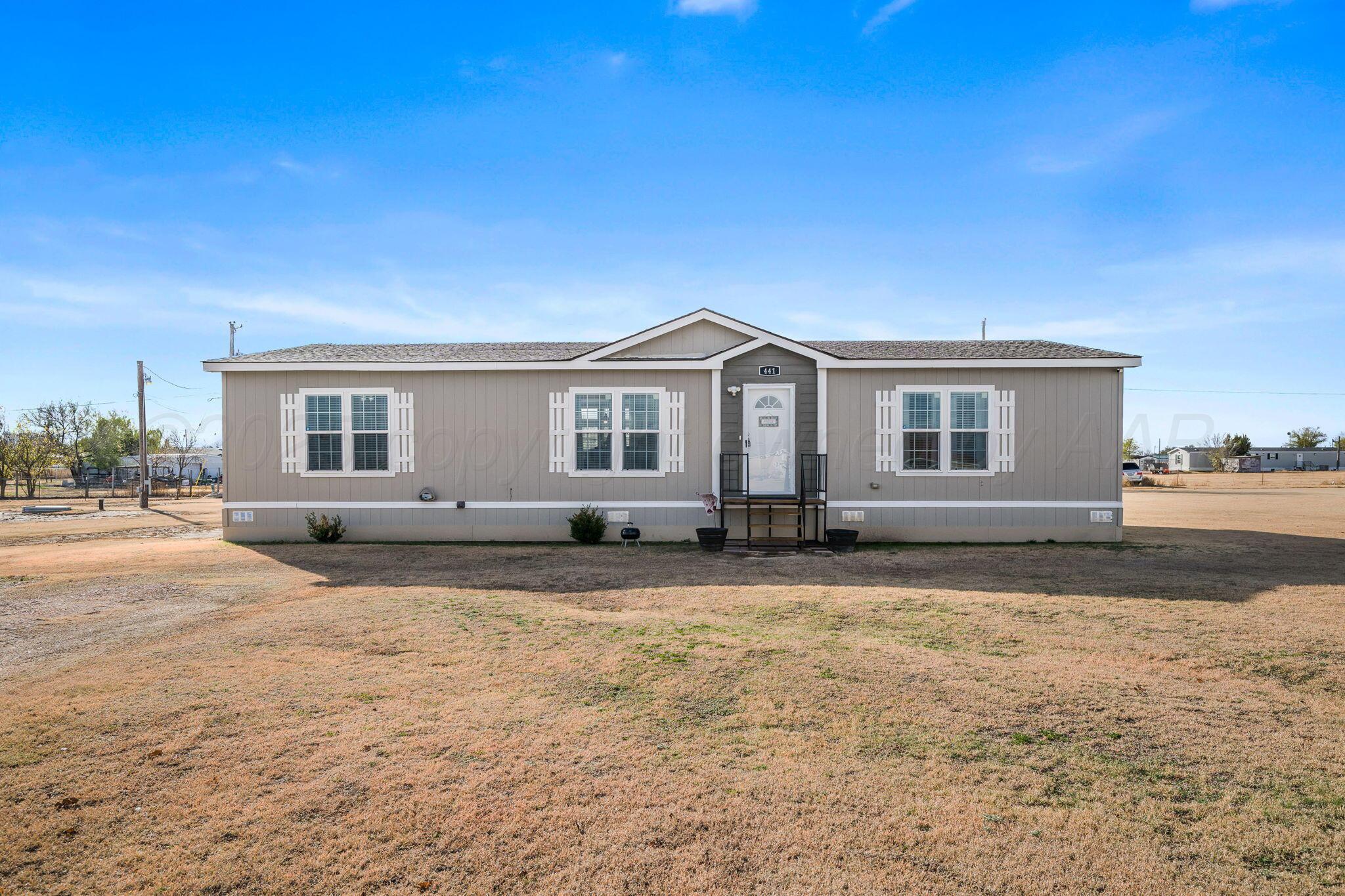 441 West Plantation Road Amarillo, TX 79118 - Photo 24 of 25 a view of a yard in front of a house