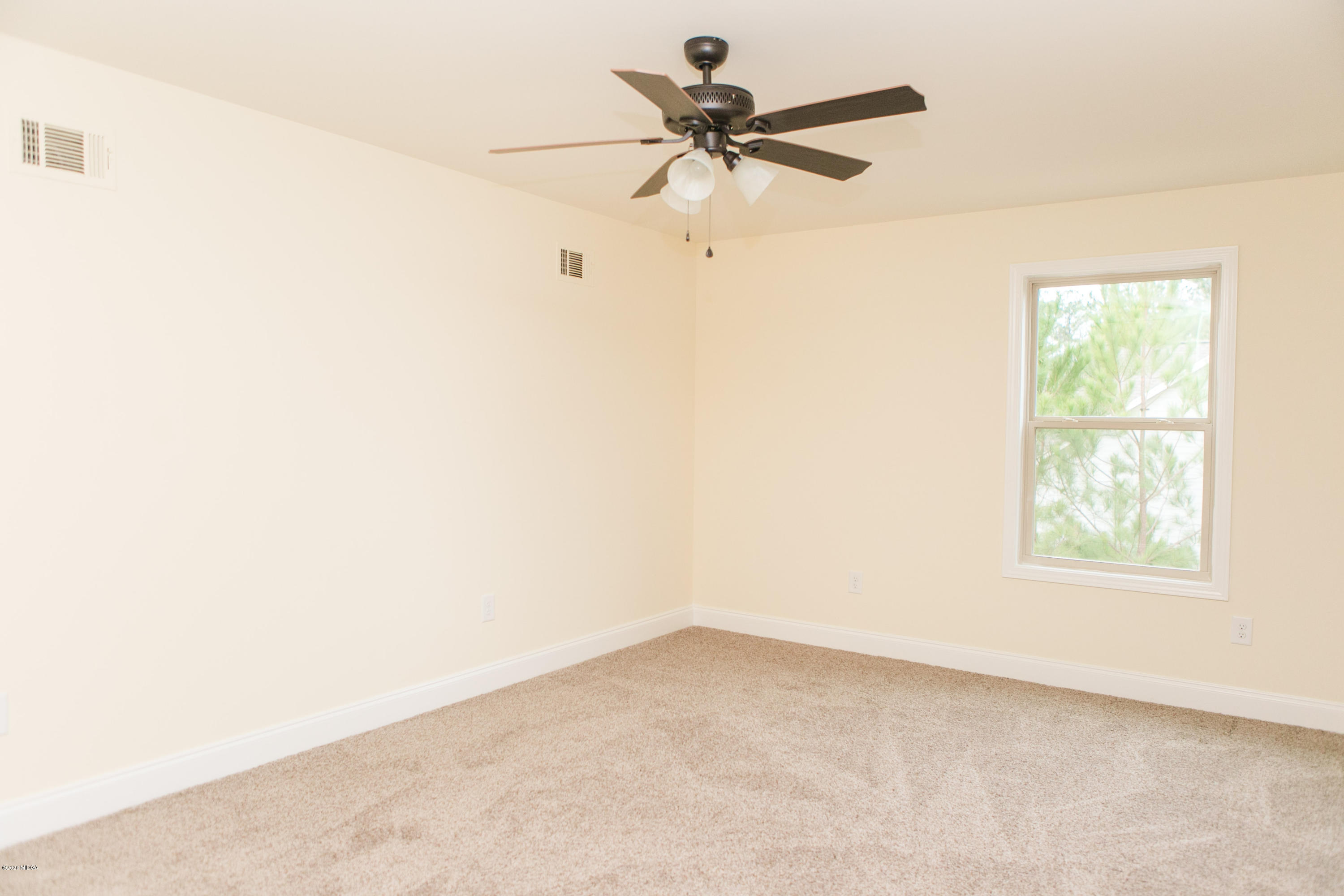 333 Walnut Grove Road Gray, GA 31032 - Photo 22 of 27 an empty room with a window