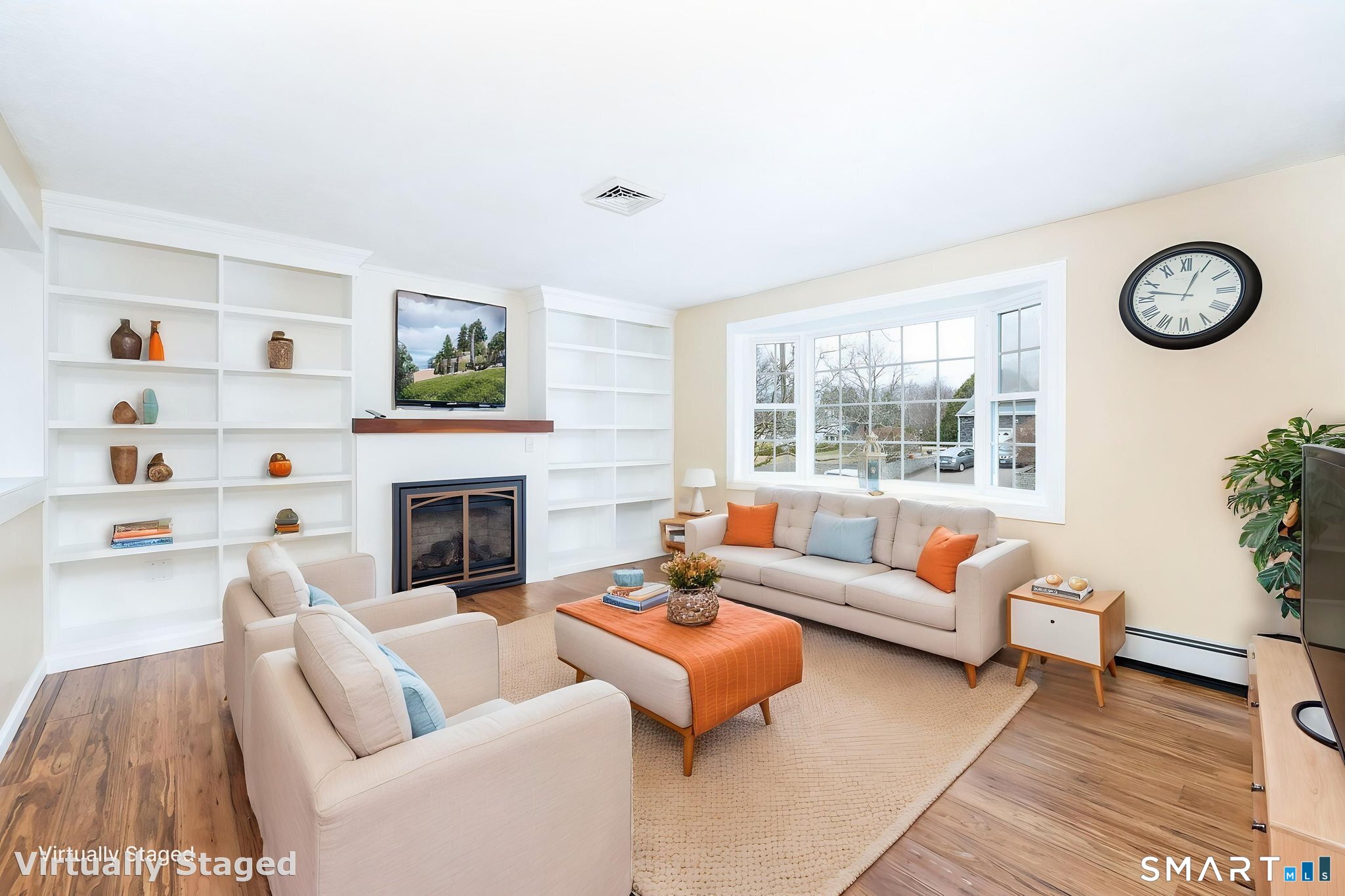 8 Still Field Road Manchester, CT 06040 - Photo 19 of 38 a living room with furniture a fireplace and a large window