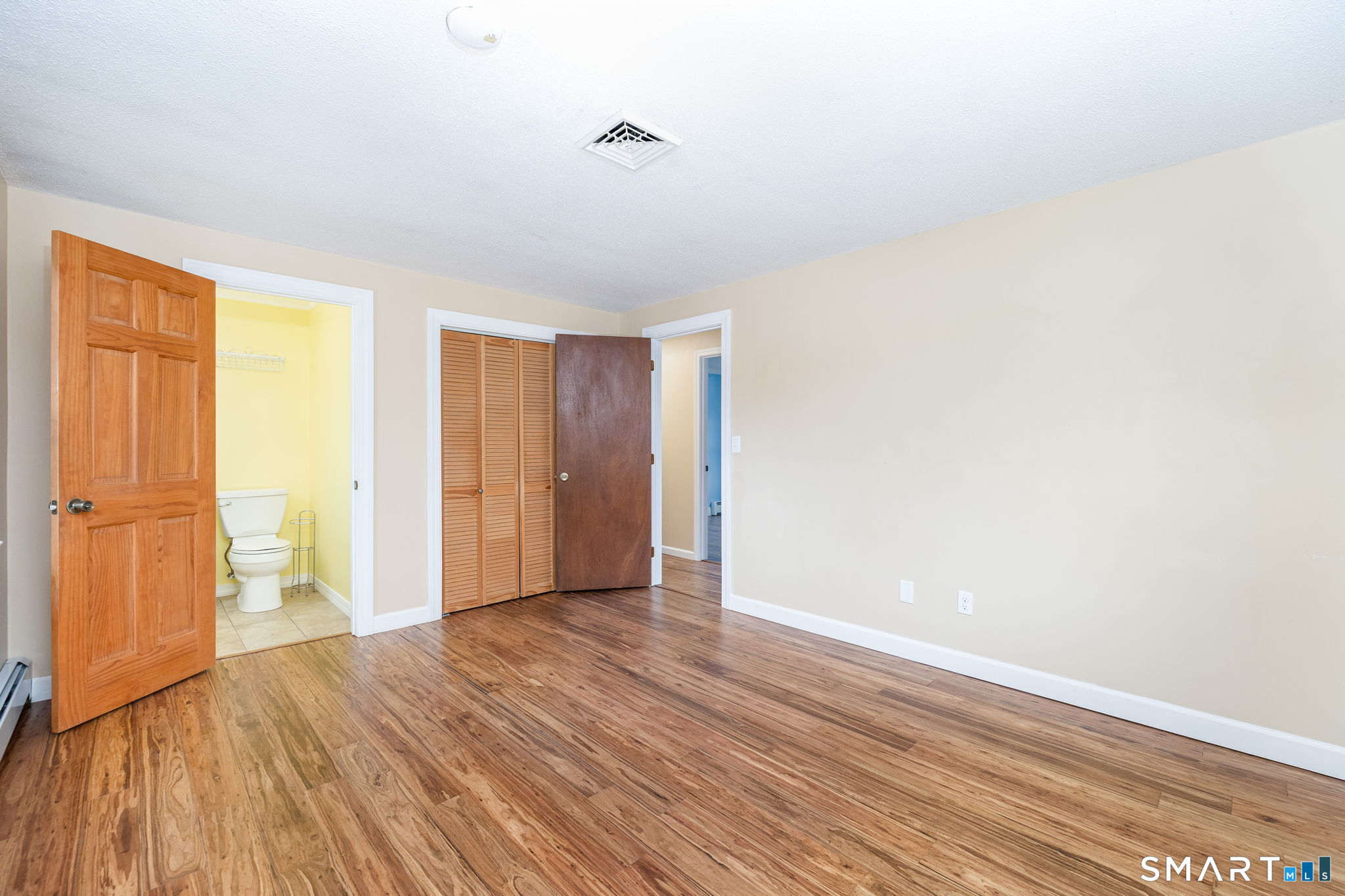 8 Still Field Road Manchester, CT 06040 - Photo 20 of 38 a view of an empty room with wooden floor