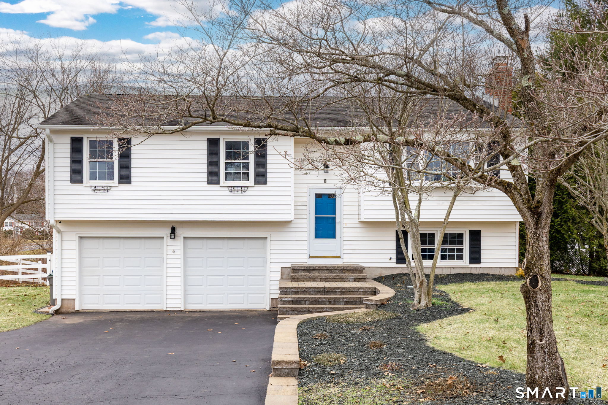 8 Still Field Road Manchester, CT 06040 - Photo 2 of 38 a front view of a house with a yard and garage