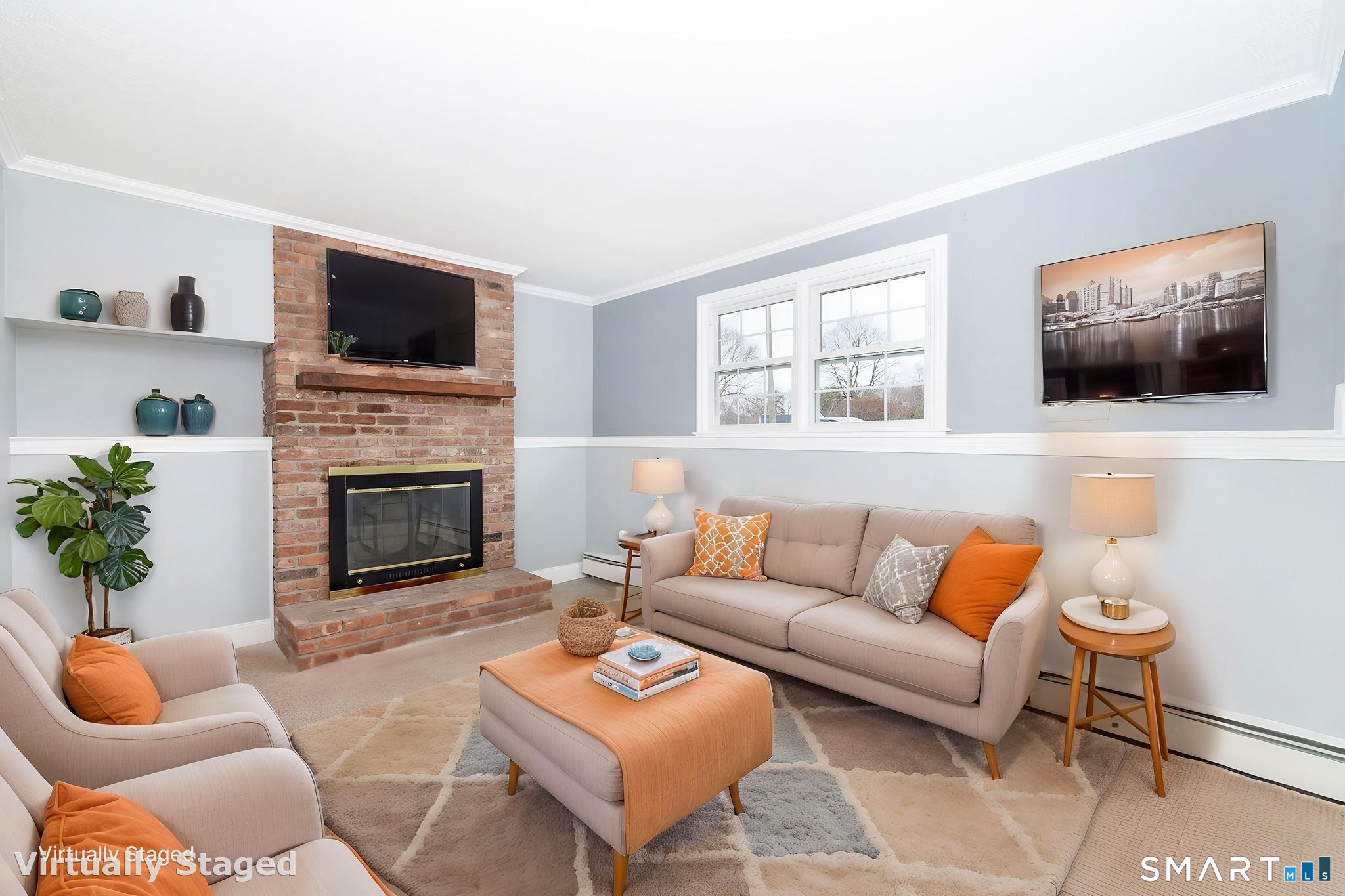 8 Still Field Road Manchester, CT 06040 - Photo 35 of 38 a living room with furniture a flat screen tv and a fireplace