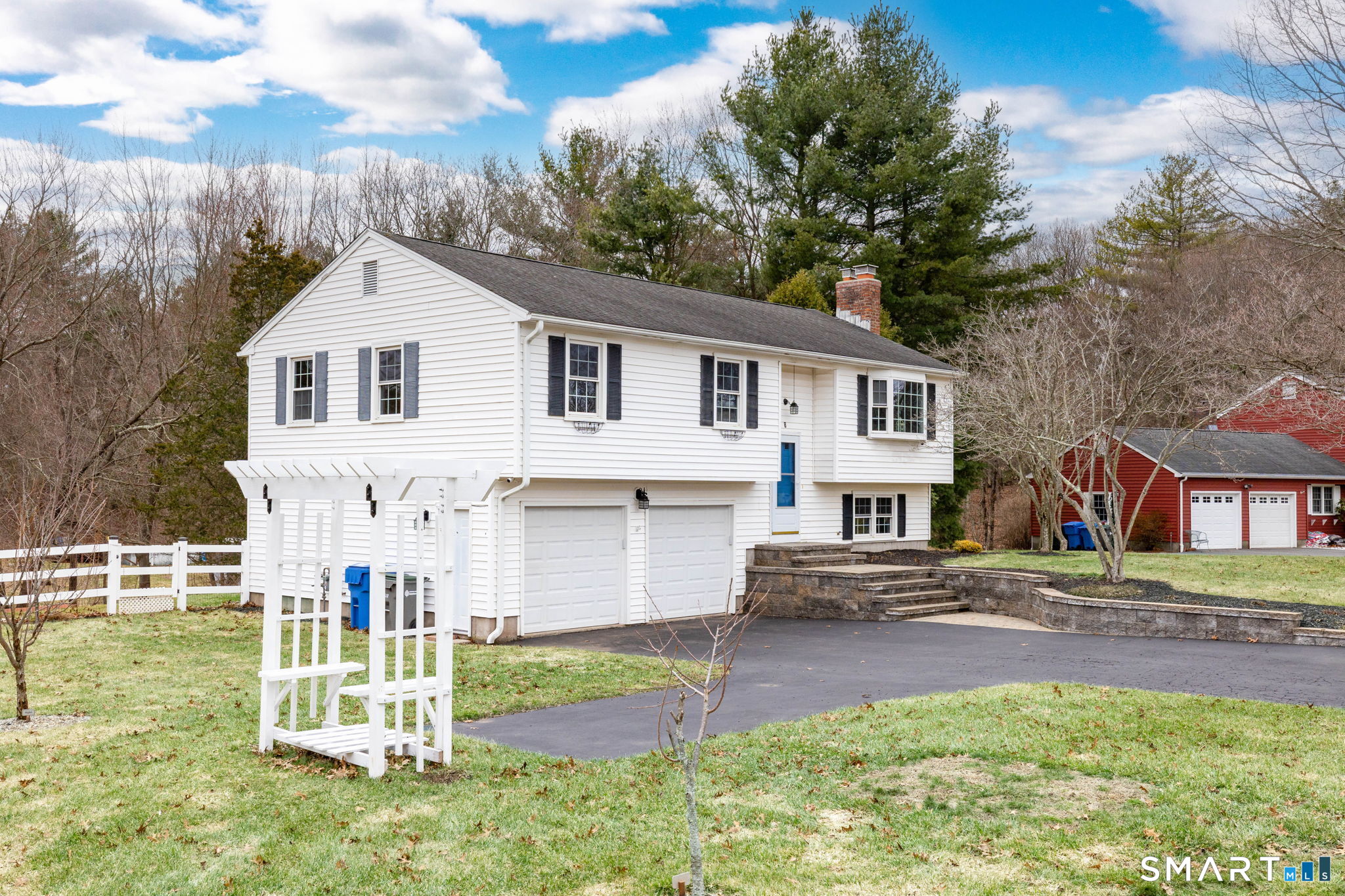 8 Still Field Road Manchester, CT 06040 - Photo 4 of 38 a front view of a house with a yard