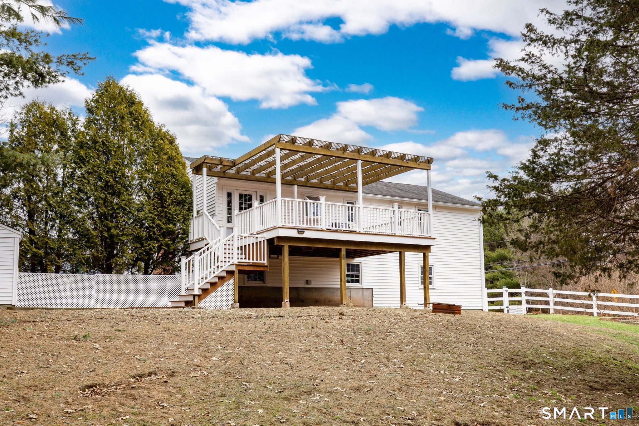 8 Still Field Road Manchester, CT 06040 - Photo 7 of 38 a view of a house with a yard and garage