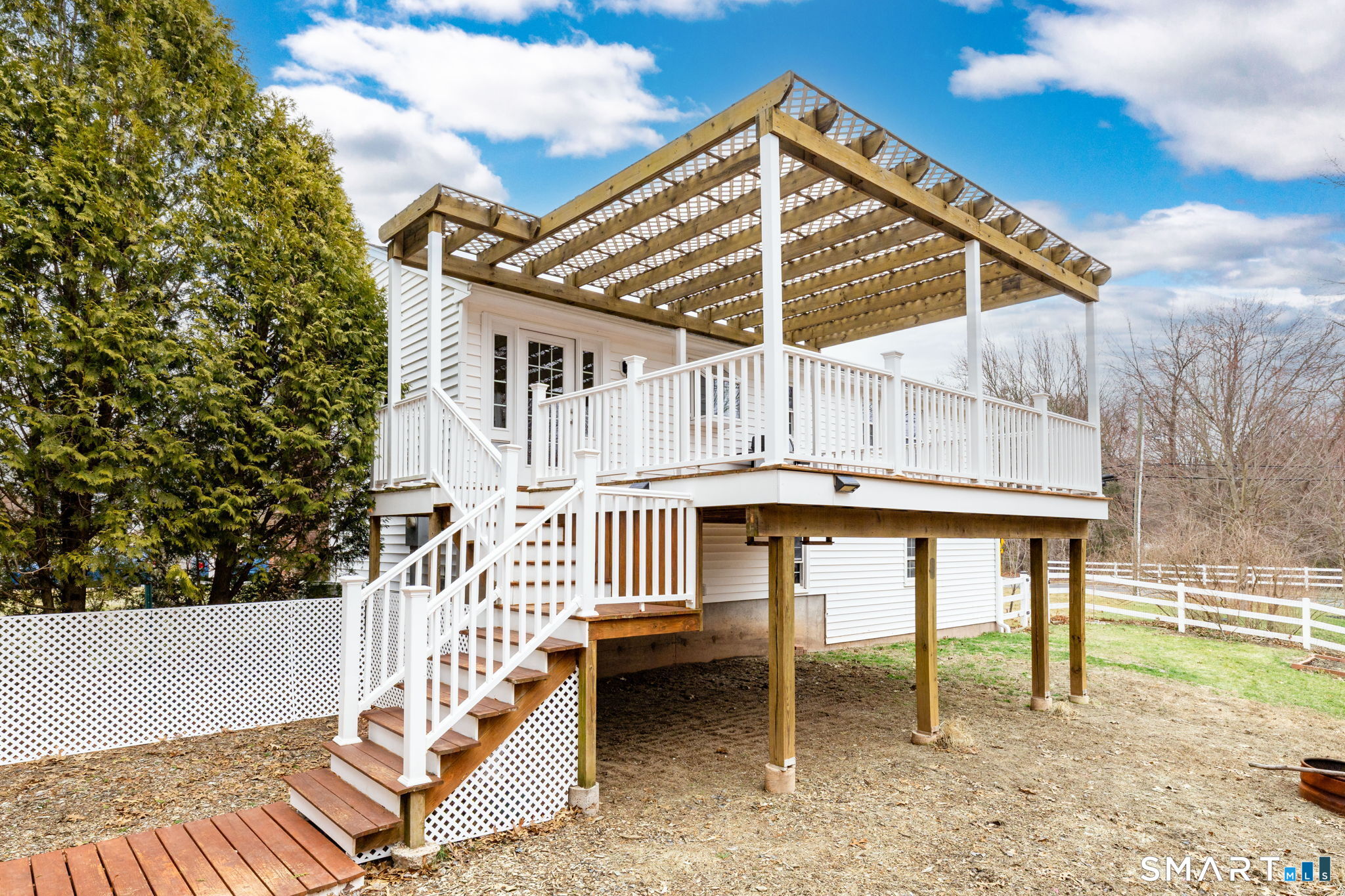 8 Still Field Road Manchester, CT 06040 - Photo 8 of 38 a balcony with table and chairs