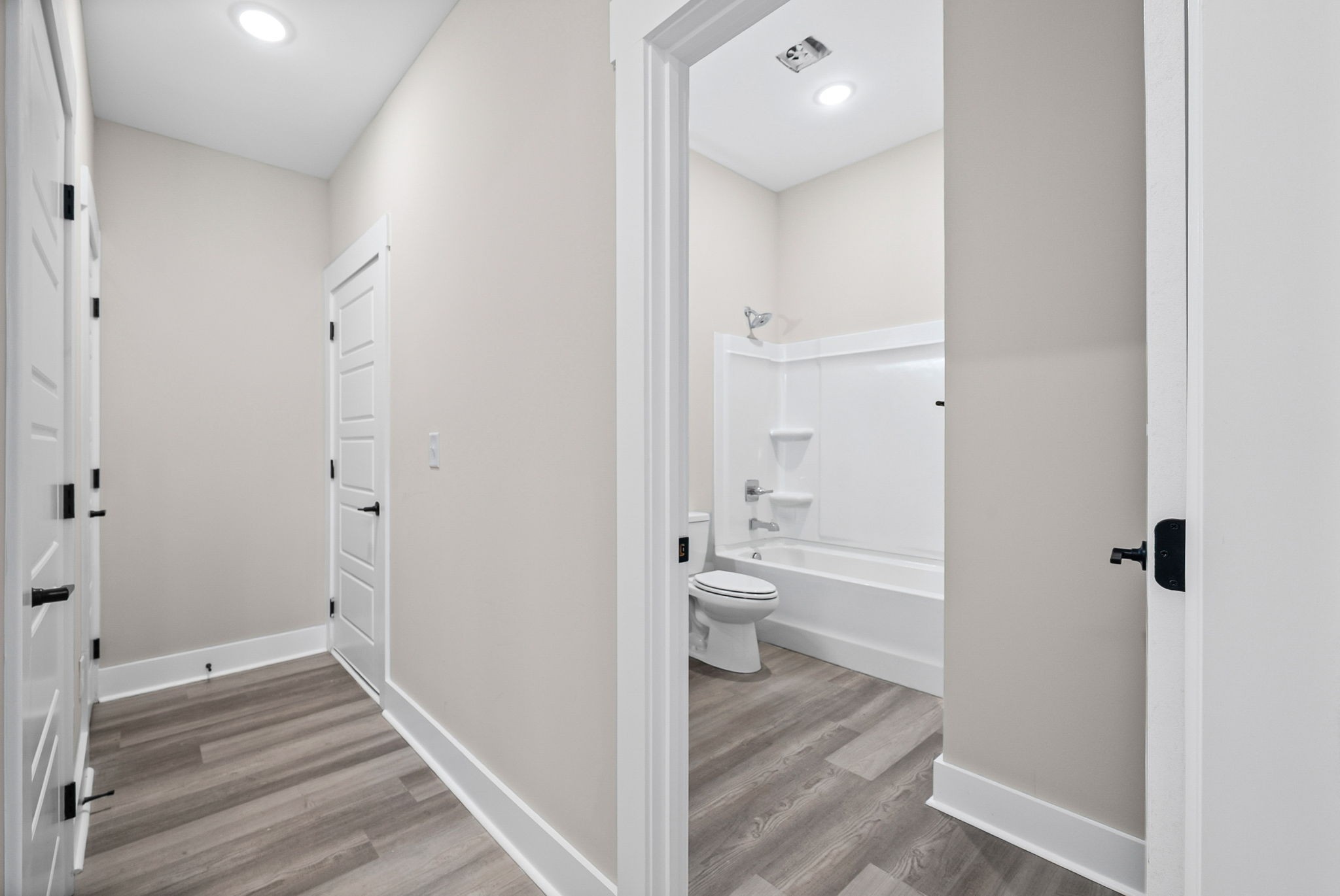 438 Centre Street Pleasant View, TN 37146 - Photo 14 of 44 a view of a bathroom from a hallway