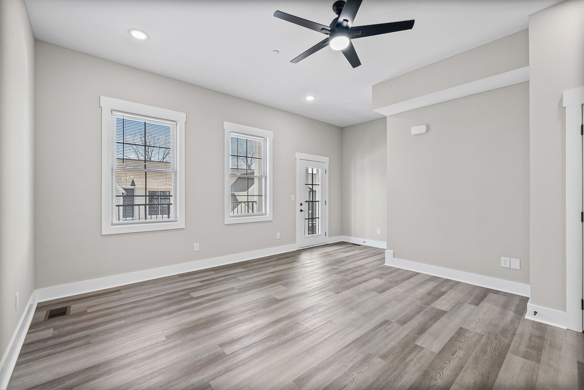 438 Centre Street Pleasant View, TN 37146 - Photo 23 of 44 a view of empty room with wooden floor and fan