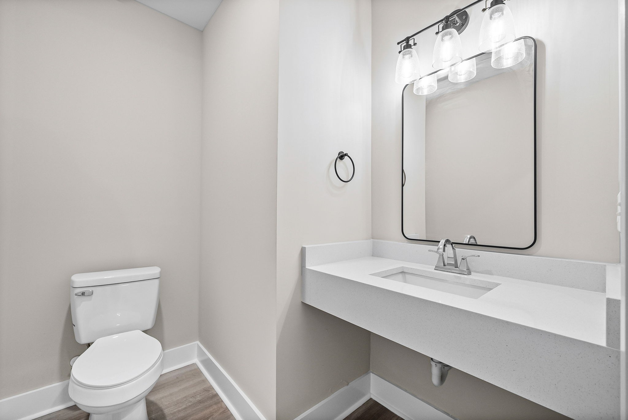438 Centre Street Pleasant View, TN 37146 - Photo 25 of 44 a bathroom with a toilet a sink a mirror and vanity