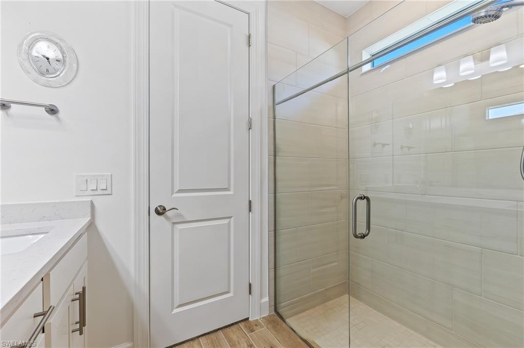 15850 Blue Rdg Way Punta Gorda, FL 33982 - Photo 17 of 23 a bathroom with a shower and a sink