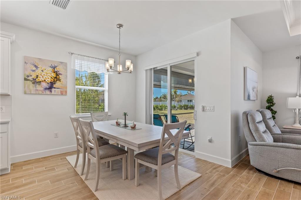 15850 Blue Rdg Way Punta Gorda, FL 33982 - Photo 2 of 23 a view of a dining room with furniture window and outside view