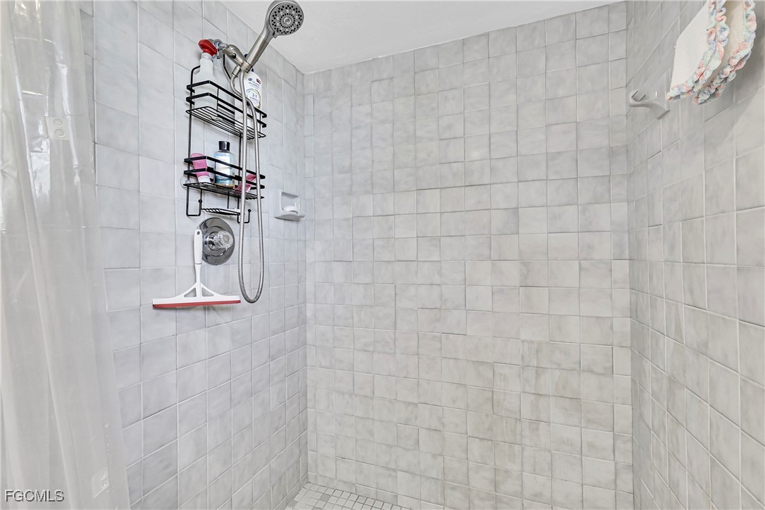 19165 Coconut Road Fort Myers, FL 33967 - Photo 18 of 27 a bathroom with a shower