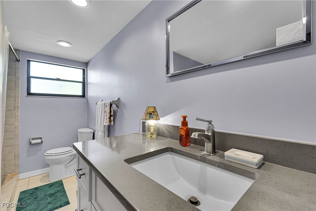 19165 Coconut Road Fort Myers, FL 33967 - Photo 20 of 27 a bathroom with a sink and a toilet