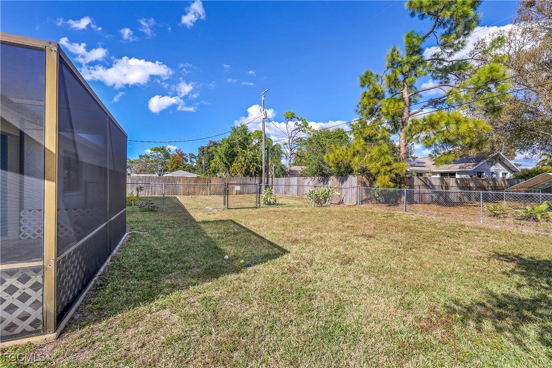 19165 Coconut Road Fort Myers, FL 33967 - Photo 23 of 27 a view of a backyard with tree s