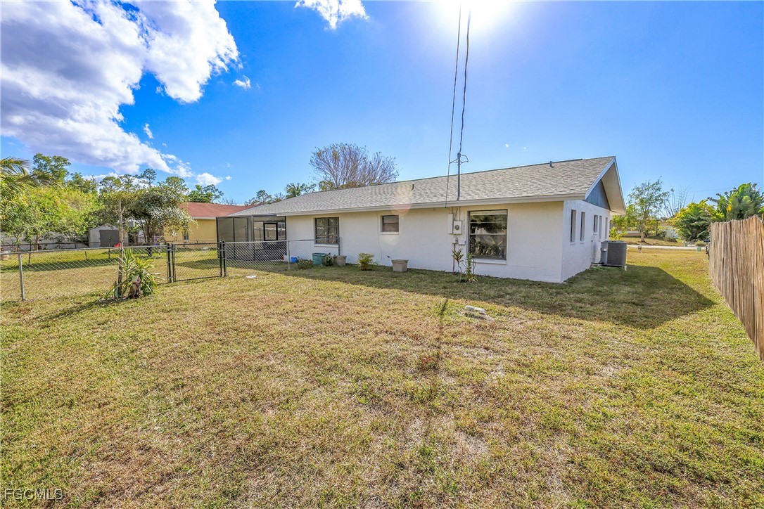 19165 Coconut Road Fort Myers, FL 33967 - Photo 25 of 27 a view of a house with a backyard