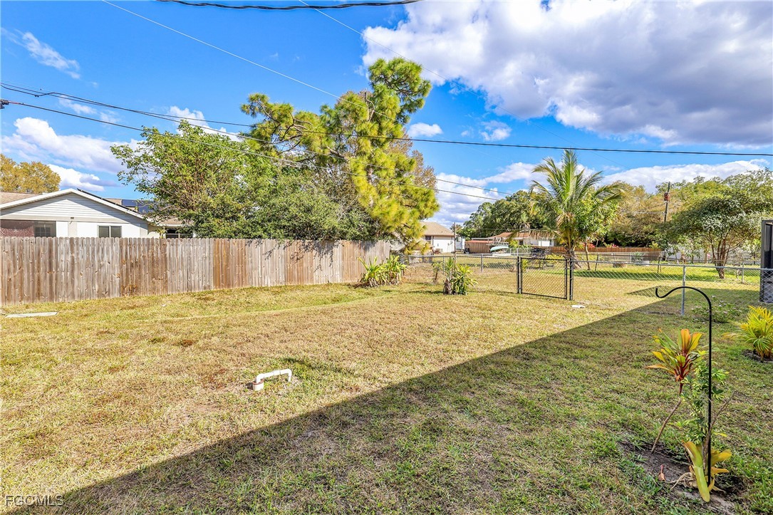 19165 Coconut Road Fort Myers, FL 33967 - Photo 27 of 27 a view of a swimming pool with a yard