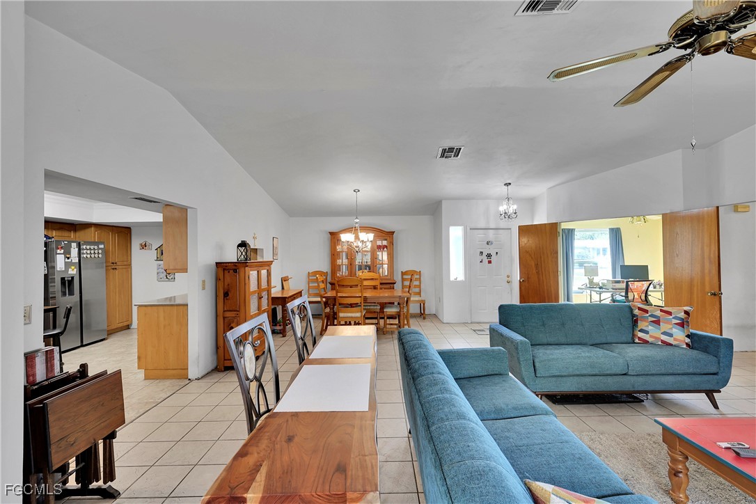 19165 Coconut Road Fort Myers, FL 33967 - Photo 5 of 27 a living room with furniture and a large window