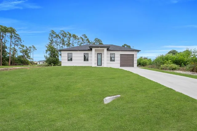 $289,900 | 57 Xelda Avenue South, Lehigh Acres, FL 33976