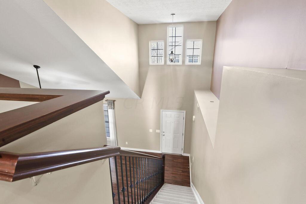 6163 Jennis Road Westerville, OH 43081 - Photo 23 of 44 • Tan carpet
• Tan painted walls
• Attic access