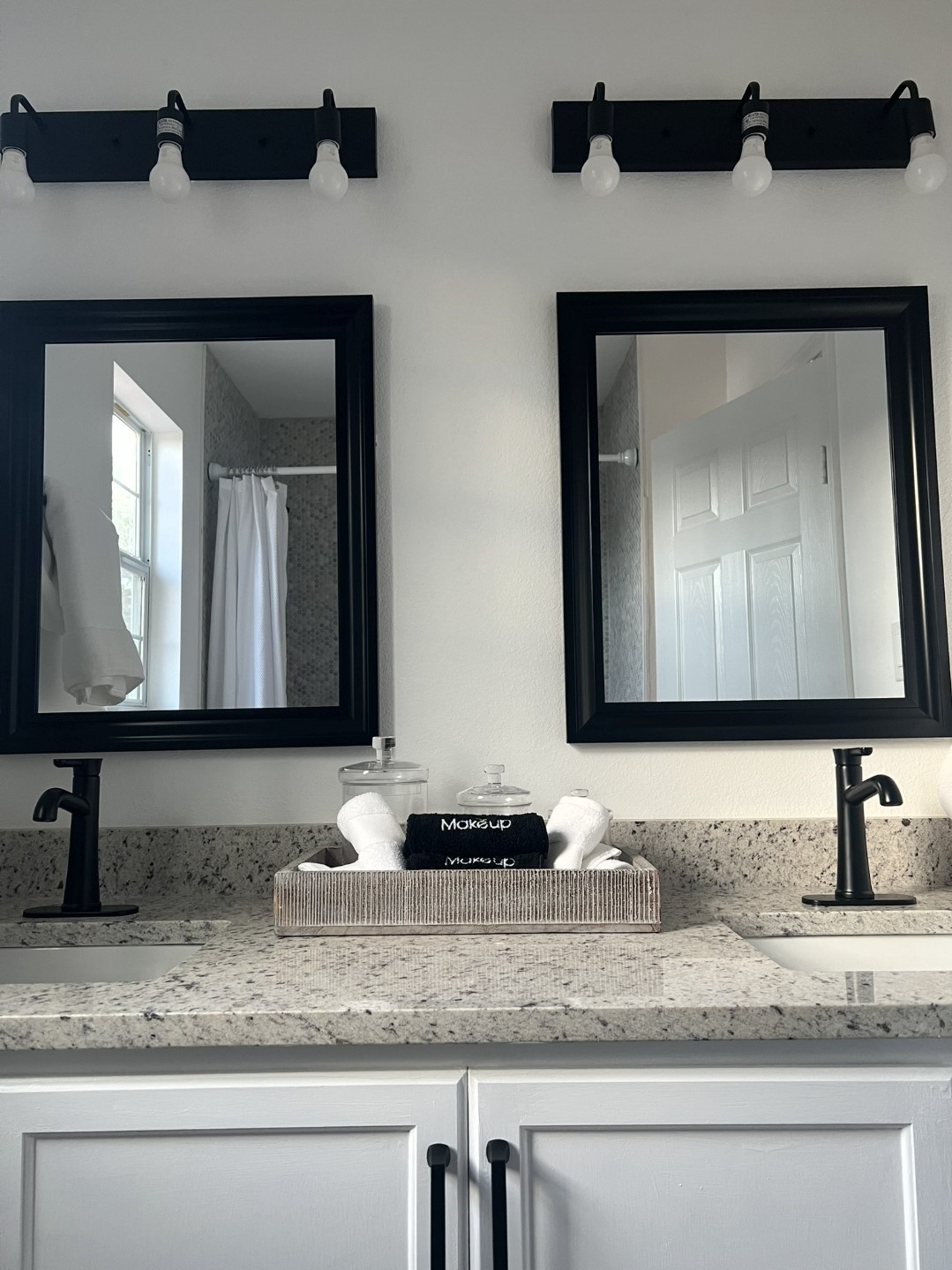 620 St Lawrence River Road Conroe, TX 77316 - Photo 16 of 21 a bathroom with mirror sink and vanity